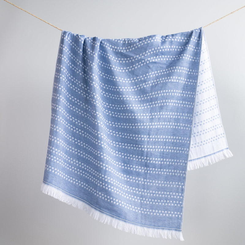 Hanging blue Lakshmi Turkish cotton bath and beach towel Urban Pera 